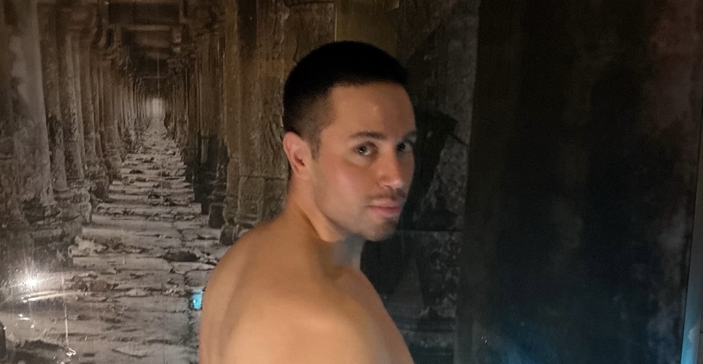 Din Tanovic — a quiet moment in a warm stone spa corridor